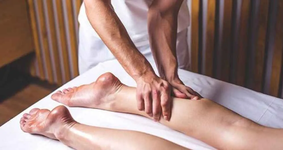 Physiotherapist treating a patient’s lower back